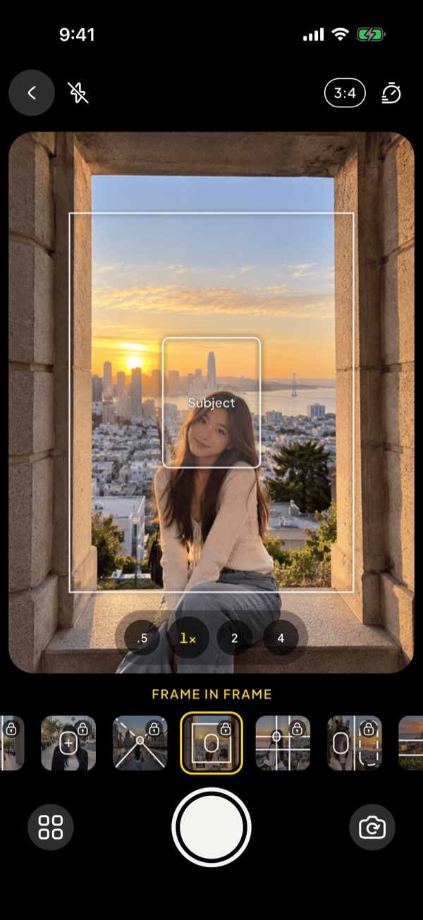 The Beginner Cam camera with a Frame in frame guide: a woman framed by a stone window over the city at sunset